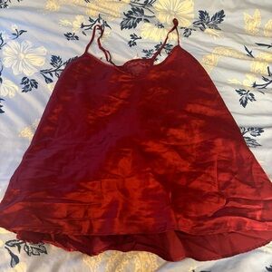 Red satin slip racerback tank top with sheer lace detail in the back